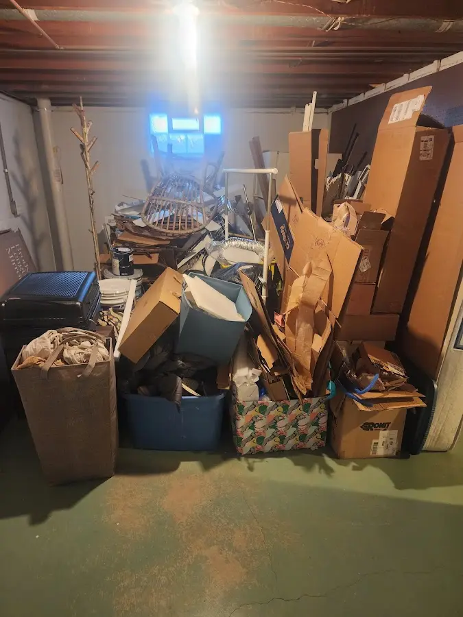 Roll-off dumpster container at job site for 2 Yard Dumpster Rental in Hamburg